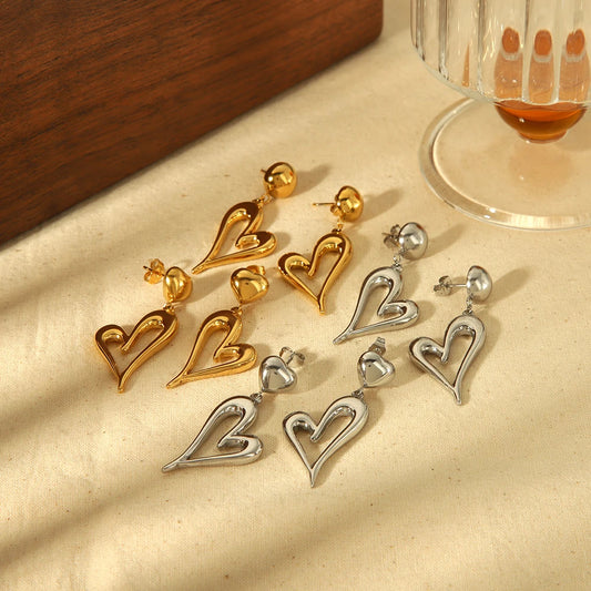 High Quality Hypoallergenic Gold Plated Hollow Out Asymmetric Heart Pendant Earrings Waterproof Stainless Steel Huggies Earrings